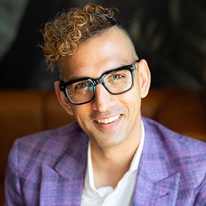 Christopher Ali, PhD speaking at Broadband Communities Summit