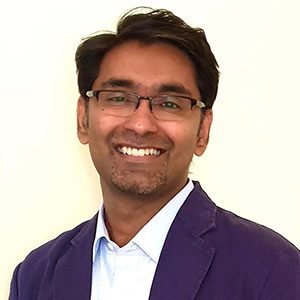 Dinesh Deva speaking at Seamless Europe