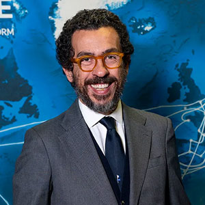 Ambrogio Michetti speaking at Submarine Networks World