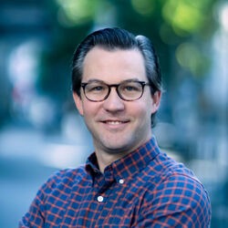 Kristian Corby speaking at EV Charging Summit, Las Vegas