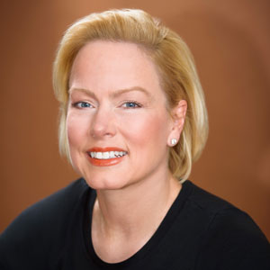 Angela Strand speaking at MOVE America